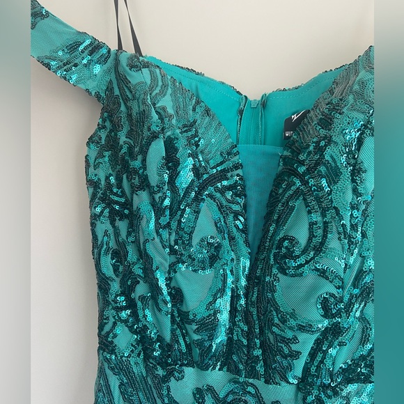 Emerald Green Off Shoulder Evening Gown with Ruched Neckline and Embellished Detail